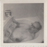 Anderman: Max. In bathtub with cigar & newspaper.