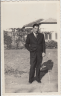 Mandel: Herman (in suit)